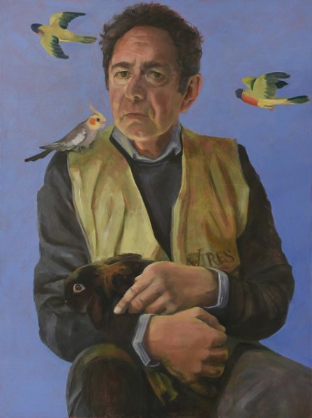Portrait of a man, seated, with tame birds.